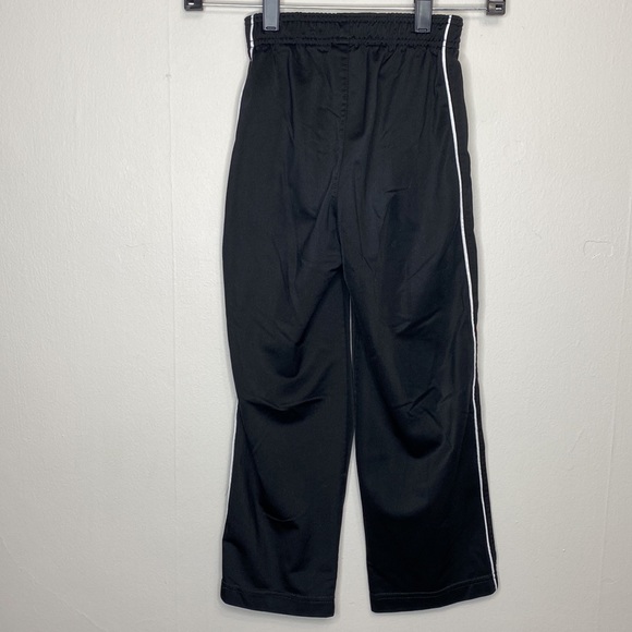 Kids Nike Sz 6 black slick sweatpants - Picture 2 of 3